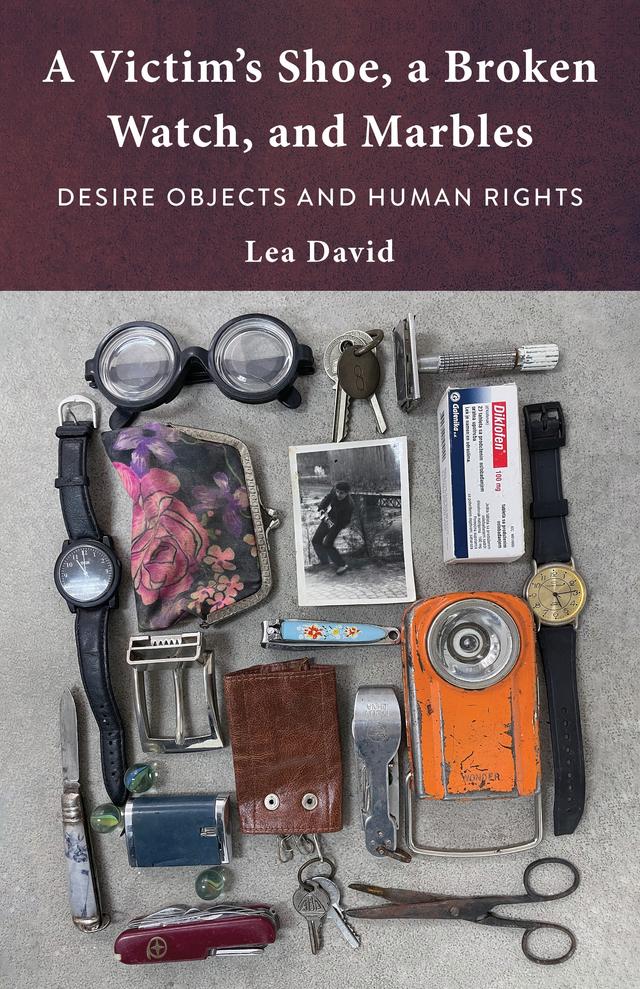 A Victim's Shoe, a Broken Watch, and Marbles by Lea David